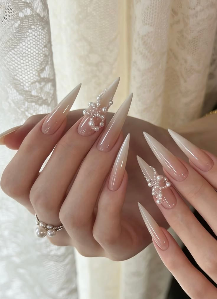 Custom luxury stiletto Bio Gel nails with pearl art by La Paige Nails inside Sherway Gardens Mall