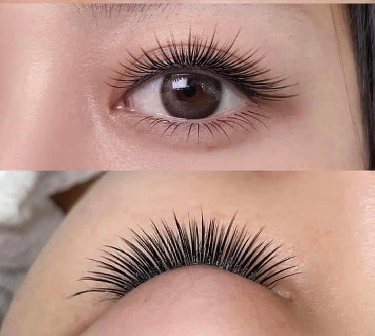 Close up of perfectly isolated classic lash extensions with natural curl