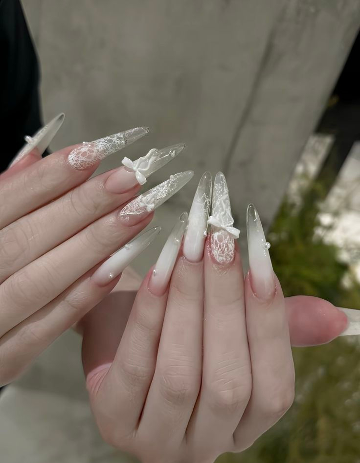Luxury white lace and pearl custom nail art design at La Paige Nails Sherway Gardens