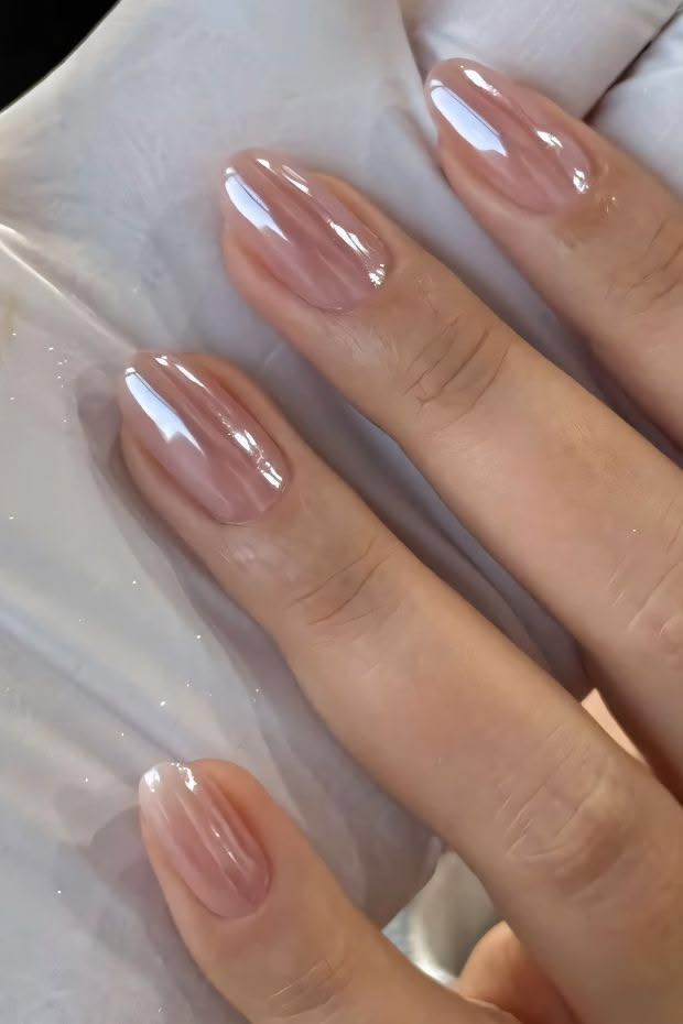 Glossy sheer pink glazed donut nails crafted at La Paige Nails Sherway Gardens