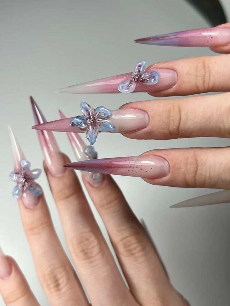 Long stiletto nail art Toronto with ombre gradient and 3D sculpted glass flowers